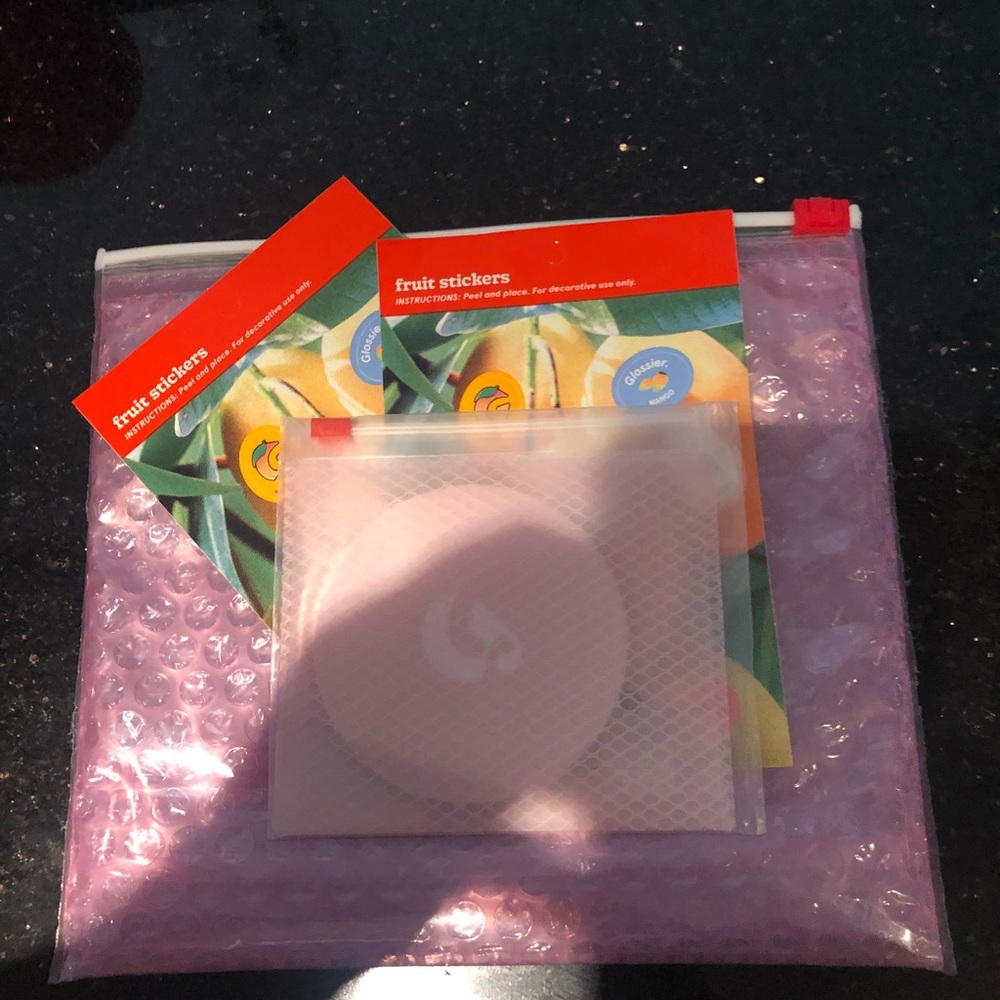 Glossier mirror with set of rare fruit stickers